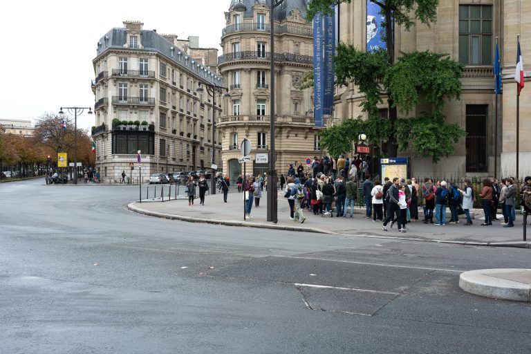 Musée Guimet and Iéna Métro Station, Paris 1 People queue outside the Iéna Métro station near the Musée Guimet on Place d'Iéna in Paris.