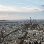 The Eiffel Tower as seen from a rooftop.
