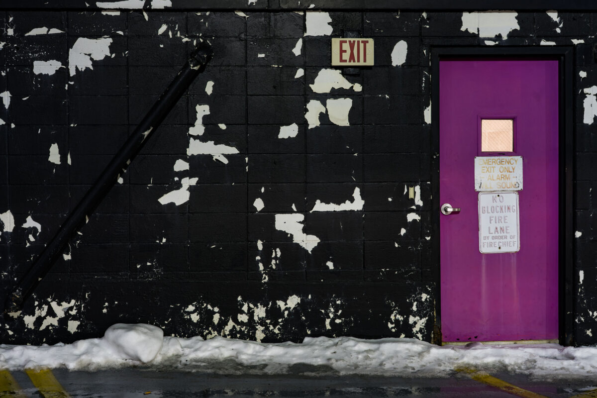 Emergency Exit Door With Peeling Paint