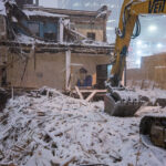 Demolition on Marquette Ave of a building to make way for  City Club Apartments.