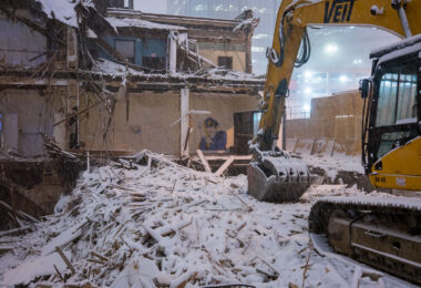 Demolition on Marquette Ave of a building to make way for  City Club Apartments.