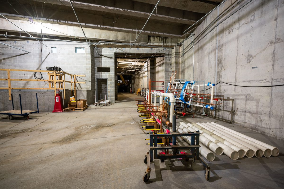 Interior of Allianz Field stadium under construction in St. Paul, Minnesota with equipment and materials.