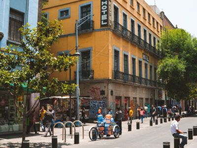 Mexico City Historic Center: Pedestrians and Yellow Hotel