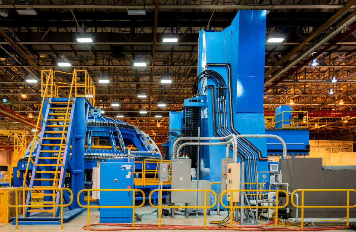 The Boeing Gore Weld Tool Station 8, labeled "FUTURAMIC TOOL & ENGINEERING COMPANY," is a large industrial machine at NASA's Michoud Assembly Facility in New Orleans, Louisiana, used for welding components for the Space Launch System.