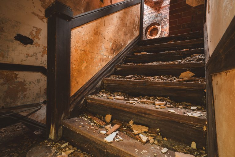 Decaying stairs in abandoned building 4 Decaying stairs in abandoned building