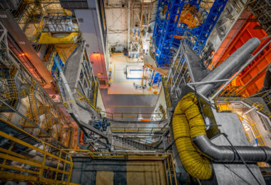 The towering interior of NASA’s Michoud Assembly Facility in New Orleans, where major components for the Space Launch System rocket are fabricated and assembled. The multilevel platforms, access walkways, and heavy structural supports surround the massive Vertical Assembly Area—an environment designed for precision alignment of rocket stages that will power Artemis missions to the Moon and beyond.