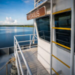 The NASA barge Pegasus moored along the Intracoastal Waterway near New Orleans, Louisiana. Originally built in 1999 to carry Space Shuttle external tanks from Michoud to Kennedy Space Center, the vessel was later extended and modernized to transport the massive core stages of NASA’s Space Launch System (SLS). Operated by the U.S. Maritime Administration and NASA’s logistics teams, Pegasus remains a vital link between Gulf Coast manufacturing and Florida launch operations for Artemis missions.