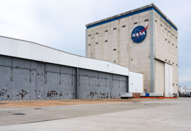 The main assembly hall of NASA’s Michoud Assembly Facility in New Orleans, Louisiana, seen from the west apron. Originally constructed during World War II for manufacturing Liberty ships and later used for Saturn V and Space Shuttle external tank production, the site continues to play a central role in the U.S. space program. Today, Boeing and NASA engineers fabricate and assemble the massive core stages of the Space Launch System (SLS) inside this facility for Artemis missions to the Moon and beyond.