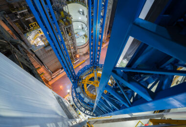 A view from the upper levels of the Vertical Assembly Center at NASA’s Michoud Assembly Facility in New Orleans. The massive blue structure supports the assembly and welding of the Space Launch System’s core stage, the primary rocket used for Artemis missions. This 170-foot-tall tool precisely aligns and joins large rocket sections, a key part of NASA’s ongoing production of deep space launch vehicles.