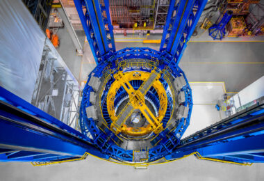 Looking downward inside the Vertical Assembly Center at NASA’s Michoud Assembly Facility in New Orleans, this view shows the precision alignment and welding platform used to assemble rocket stages. The towering blue and yellow structure is part of the tooling for the Space Launch System core stage, where massive aluminum sections are friction-stir welded to form part of NASA’s Artemis launch vehicles.