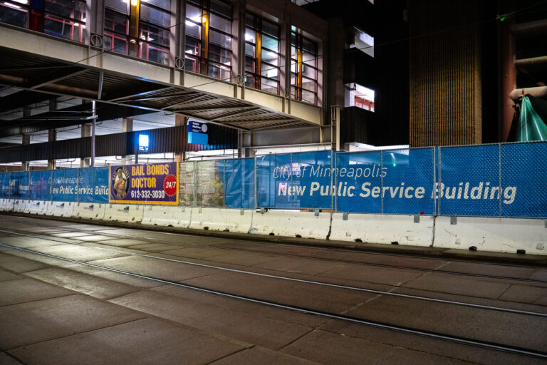 Bail Bond Doctor Banner 1 Bail Bonds and City of Minneapolis Public Service Building banners on fencing around new development.