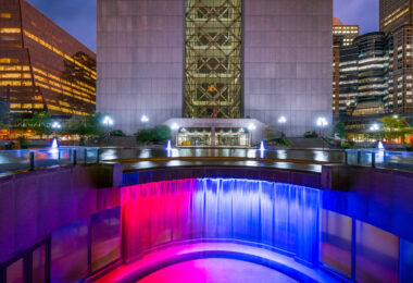 Hennepin County Government Center, construction was completed in 1977.

While often looked at as a single building, it’s actually 2 different towers with glass in between them. When viewed from the northeast or southeast(such as this photo), the building gives the appearance of the letter H for Hennepin. The towers are accessible from each other via catwalks on each floor. Glass walls were added after multiple suicides.