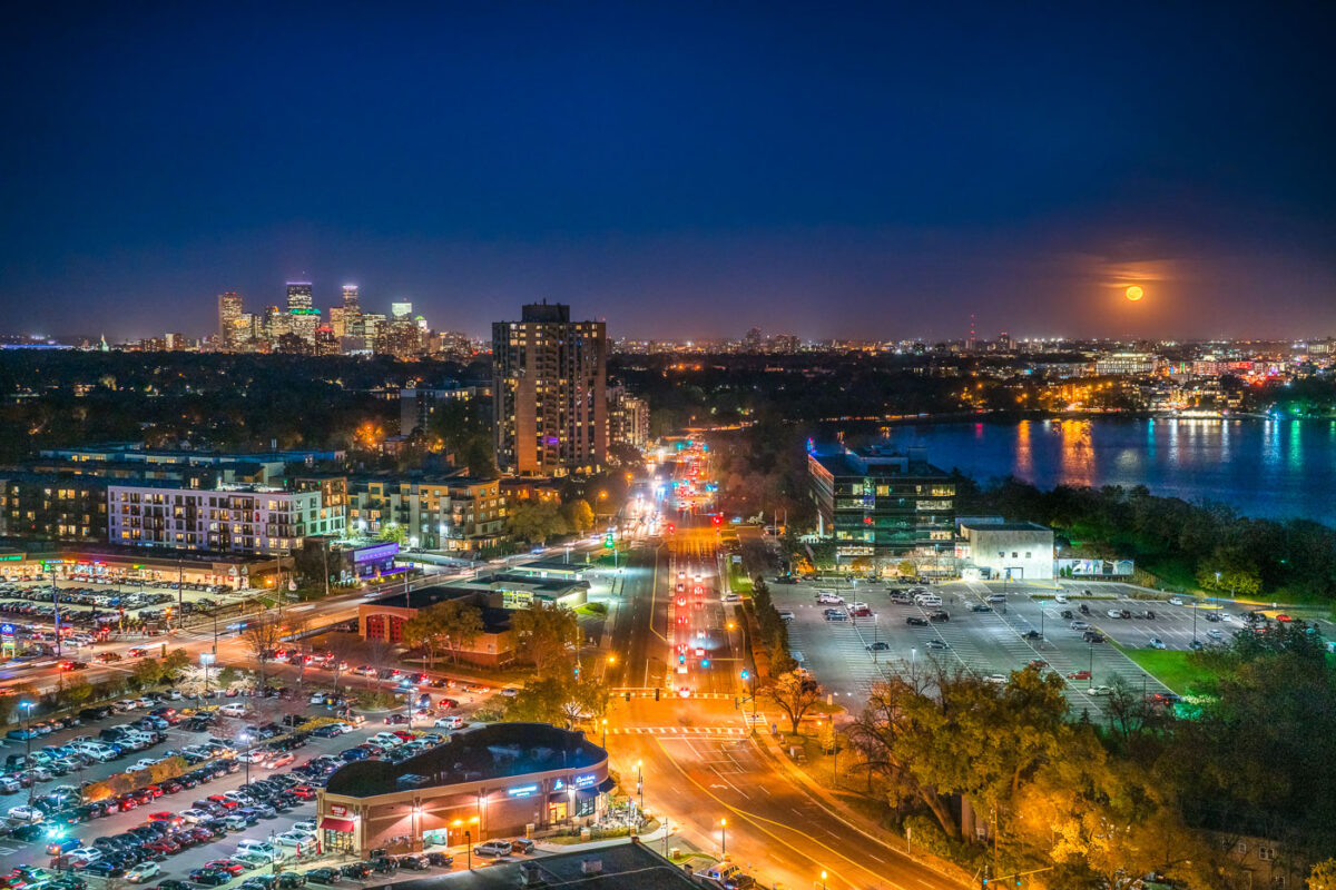 Minneapolis skyline and lakes during a full moon