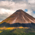 Arenal Volcano in Costa Rica with shadows from the clouds.