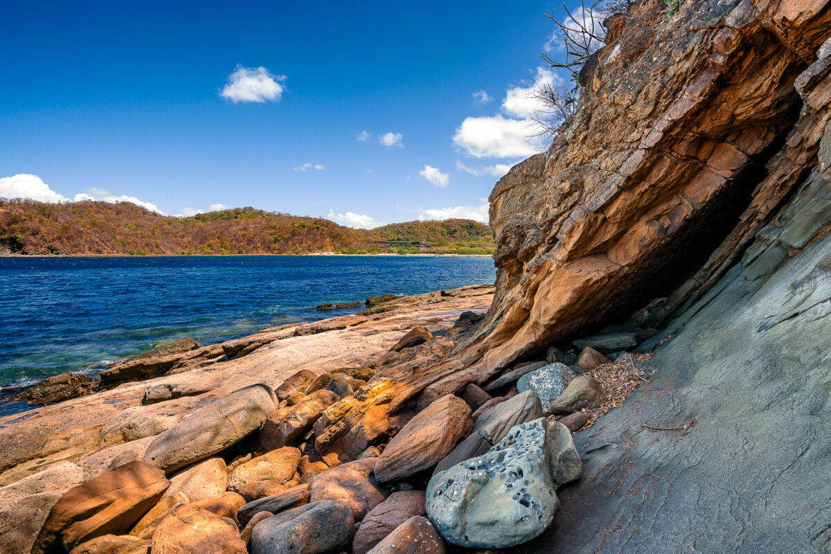 The rocky shore of Jobo Bay near El Jobo in Guanacaste Costa Rica.