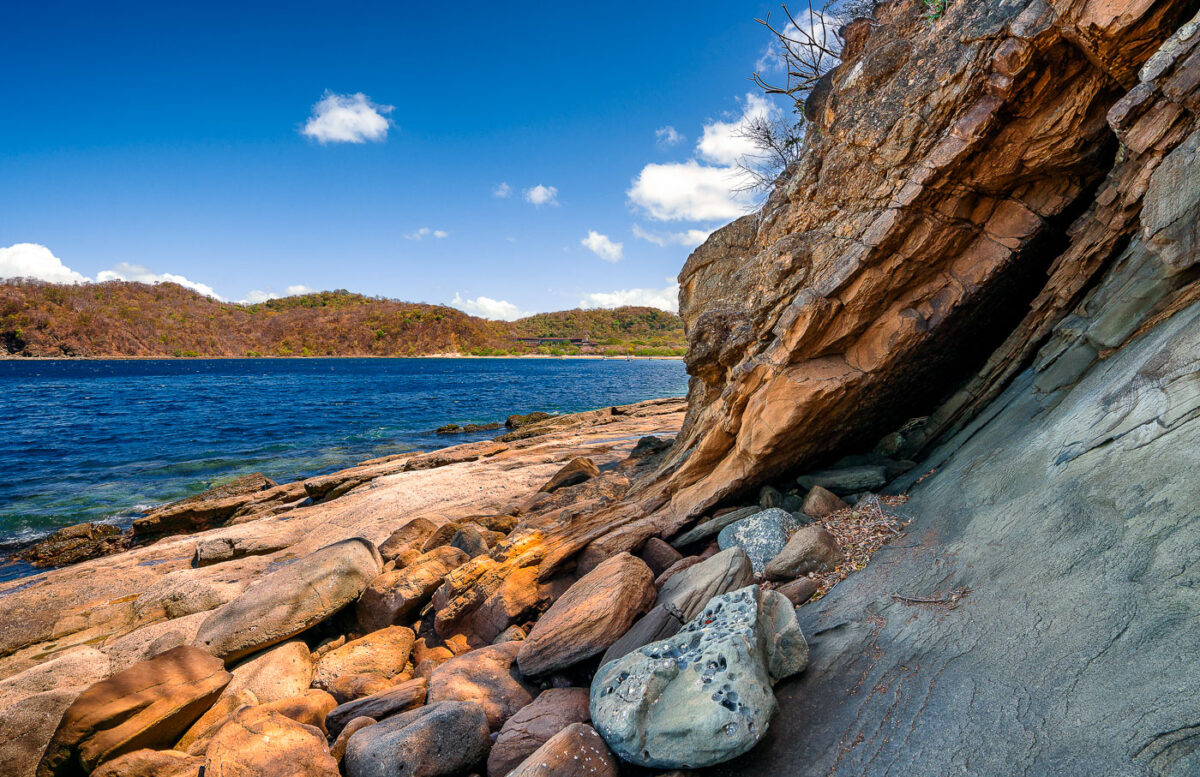 The rocky shore of Jobo Bay near El Jobo in Guanacaste Costa Rica.