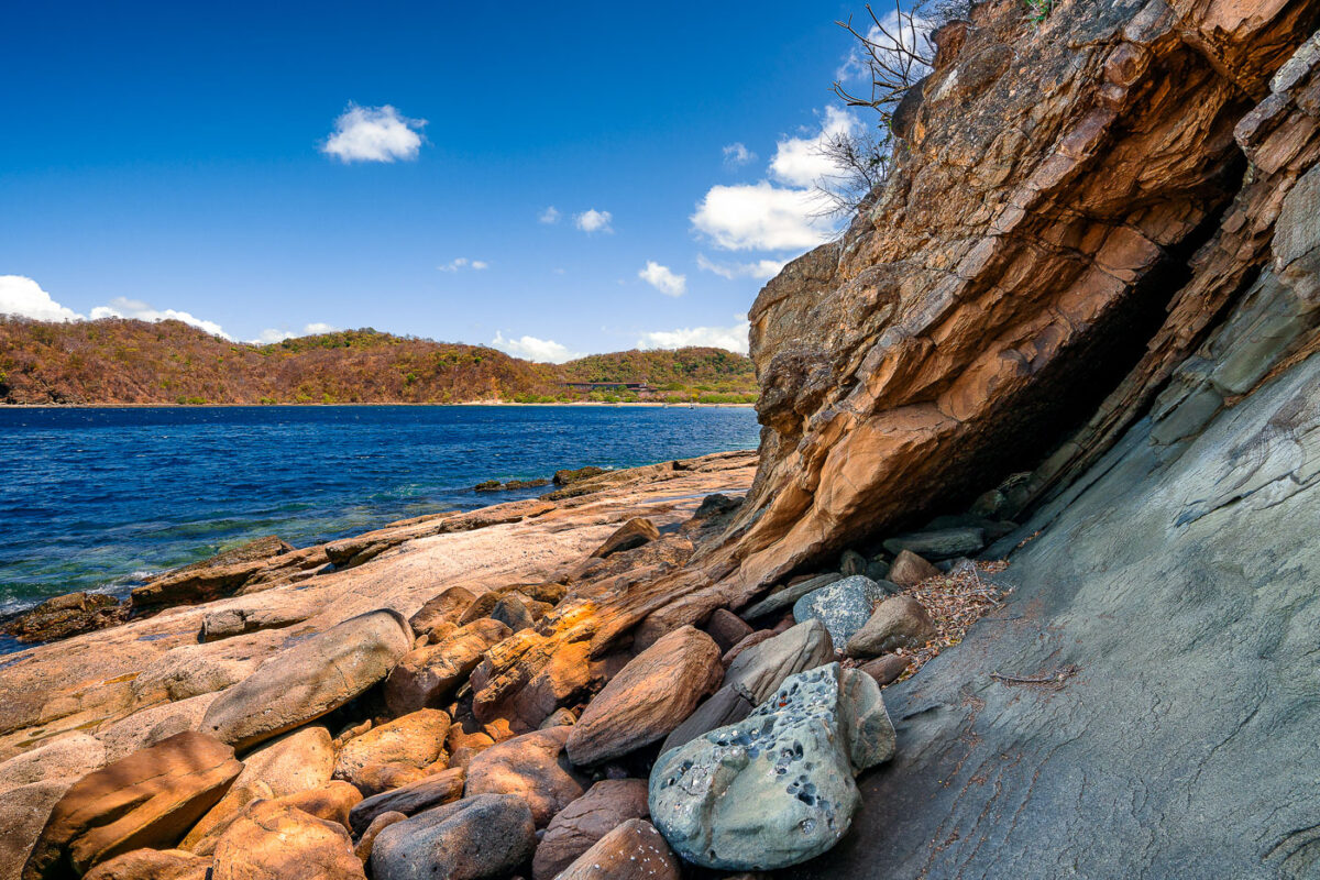 The rocky shore of Jobo Bay near El Jobo in Guanacaste Costa Rica.