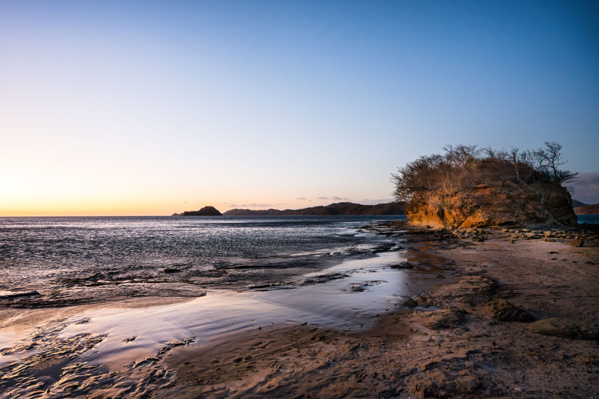 Playa Escondida Rocky Shore at Sunset
