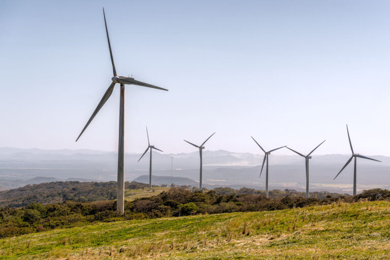 Wind Turbines in Guanacaste Province, Costa Rica 1 Wind turbines are situated across the rolling hills of Guanacaste Province, Costa Rica, a region known for its strong winds and agricultural landscape. These structures are part of the country's significant investment in renewable energy, particularly wind power, which began to expand in the early 2000s. Guanacaste's geographic position and consistent trade winds make it an ideal location for wind farms, contributing to Costa Rica's goal of achieving carbon neutrality. The turbines harness wind energy to generate electricity, playing a crucial role in the nation's power supply and its commitment to sustainable development.