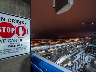 "In Crisis?" Hotline Sign Overlooking MSP Airport Construction