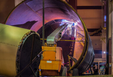 Man working on a water tank for the Hennepin Energy Recovery Center.