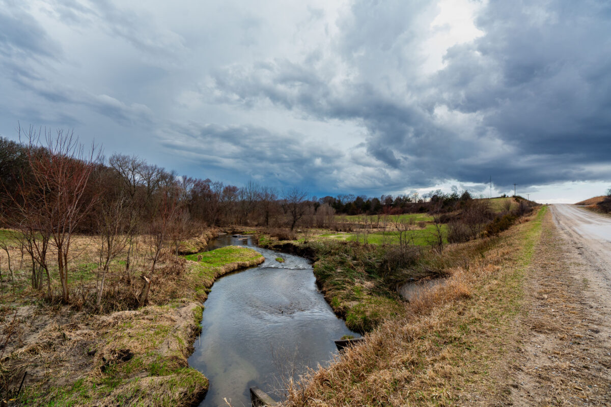 Bear Creek and Gravel Road Under Storm Clouds, Roland, Iowa