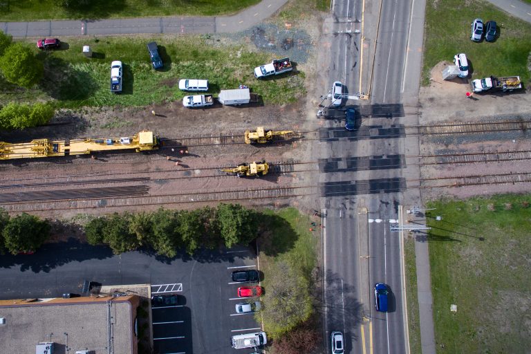 Rail Crew Works the Beltline Boulevard Crossing in St. Louis Park 3 Aerial view of light rail construction equipment crossing railroad tracks at Green Line and Beltline Boulevard in St. Louis Park.