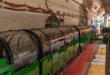 The Post Office Railway, known as Mail Rail since 1987, is a 2 ft (610 mm) narrow gauge, driverless underground railway in London that was built by the Post Office with assistance from the Underground Electric Railways Company of London, to move mail between sorting offices. Inspired by the Chicago Tunnel Company, it operated from 1927 until 2003.