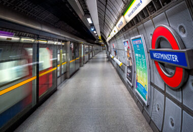 Westminster London Underground station in London. A train passing by.