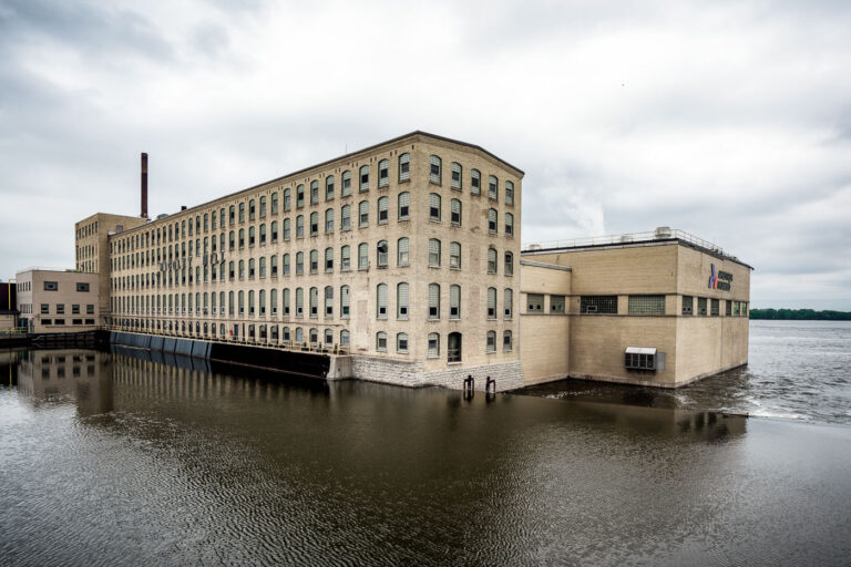 Nicolet Mill on Fox River, De Pere, Wisconsin 1 The Nicolet Mill complex in De Pere, Wisconsin, sits on the Fox River, a historic paper-making facility.