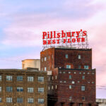 The Pillsbury A-Mill is a former flour mill located on the east bank of the Mississippi River in Minneapolis, Minnesota. It held the distinction of being the world's largest flour mill for 40 years. Completed in 1881, it was owned by the Pillsbury Company and operated two of the most powerful direct-drive waterwheels ever built, each capable of generating 1,200 horsepower (895 kW). The mill was named a National Historic Landmark in 1966 and has since been converted into resident artist lofts.