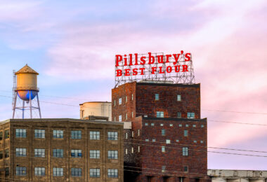 The Pillsbury A-Mill is a former flour mill located on the east bank of the Mississippi River in Minneapolis, Minnesota. It held the distinction of being the world's largest flour mill for 40 years. Completed in 1881, it was owned by the Pillsbury Company and operated two of the most powerful direct-drive waterwheels ever built, each capable of generating 1,200 horsepower (895 kW). The mill was named a National Historic Landmark in 1966 and has since been converted into resident artist lofts.