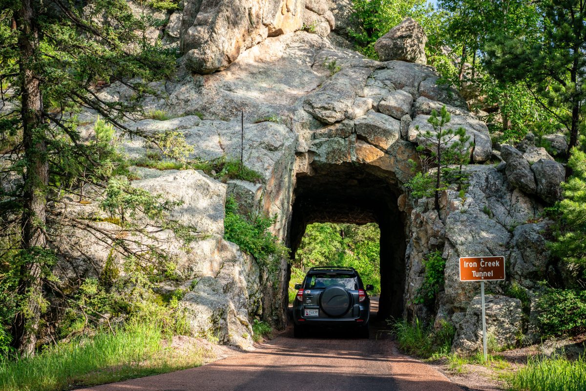 Car Enters Iron Creek Tunnel, Custer State Park