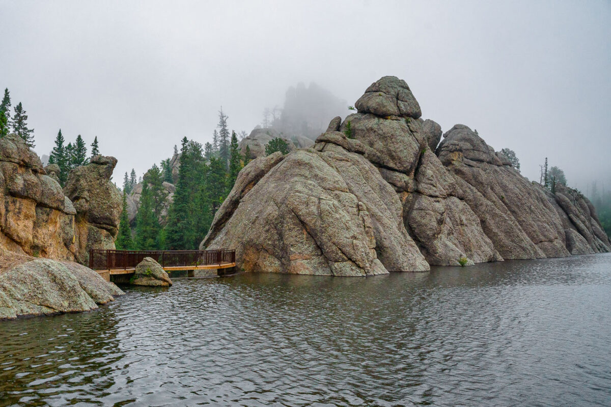 Sylvan Lake is a lake located in Custer State Park, in the Black Hills of South Dakota, United States. It was created in 1881 when Theodore Reder built a dam (the Sylvan Lake Water Dam) across Sunday Gulch Creek. The lake area offers picnic places, rock climbing, small rental boats, swimming, and hiking trails. It is also popular as a starting point for excursions to Black Elk Peak and The Needles.  -- Wikipedia