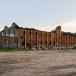 Formerly the Harris Machinery building has since been renovated into The Market at Malcolm Yards.