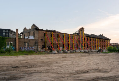 Formerly the Harris Machinery building has since been renovated into The Market at Malcolm Yards.