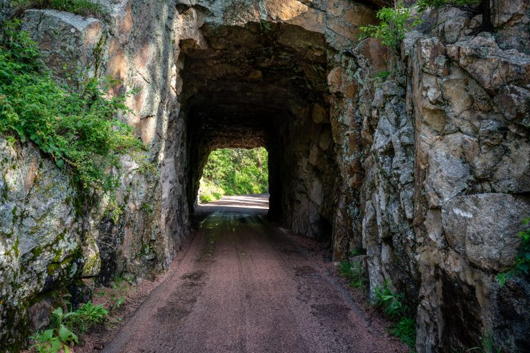 Inside Iron Creek Tunnel, Custer State Park, South Dakota 1 Stone tunnel with moss-covered walls along Iron Creek in Custer State Park, South Dakota.