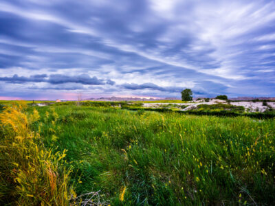Badlands National Park, South Dakota: Storm Clouds Over Grasslands