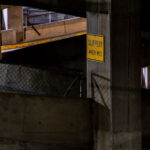 A "Slippery When Wet" sign in a downtown Minneapolis parking garage.