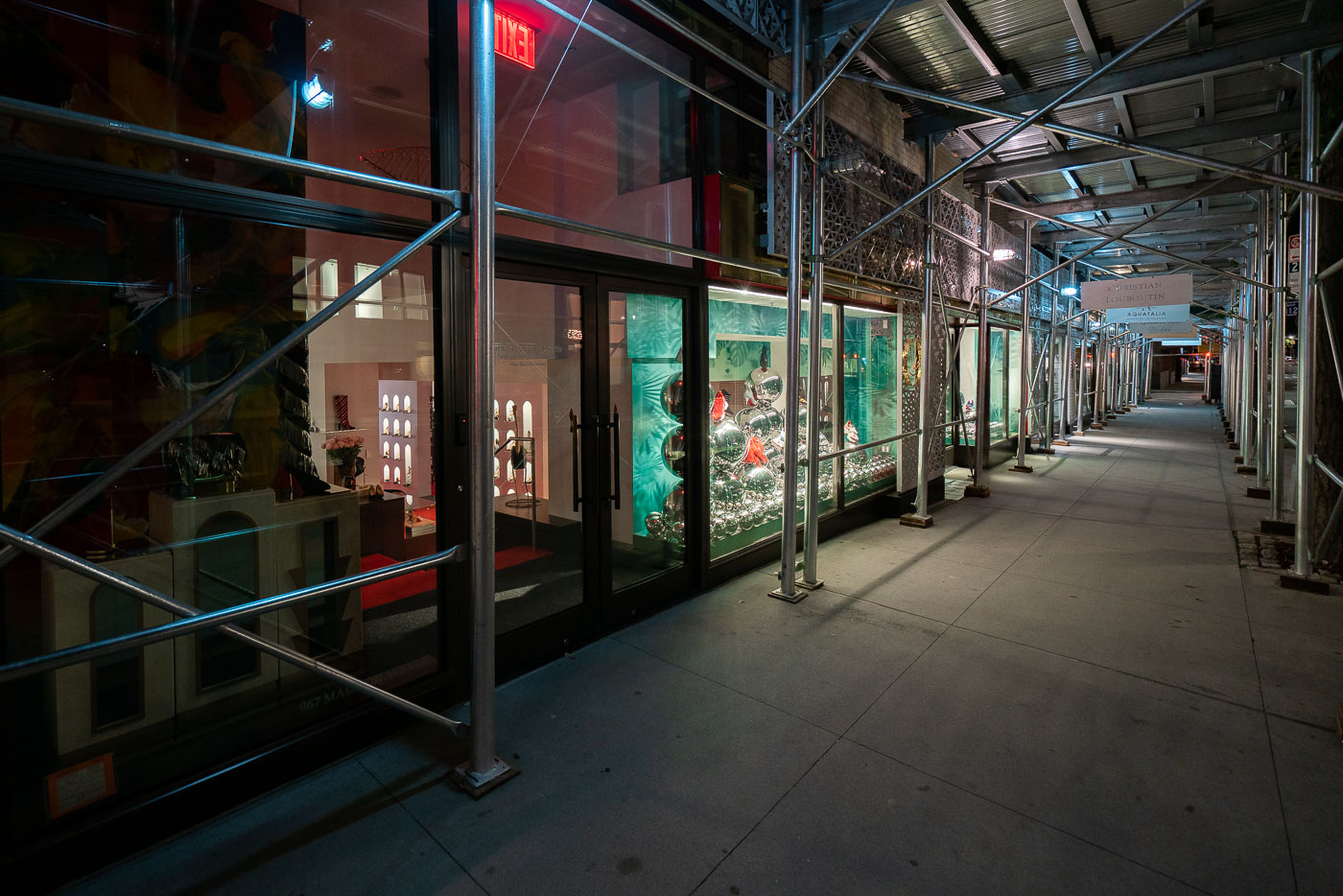 Christian Louboutin under scaffolding on Madison Avenue