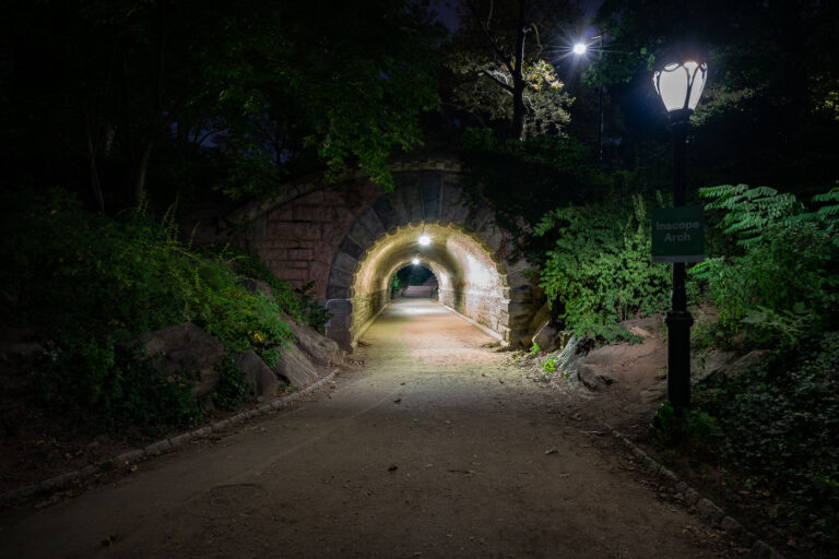 Inscope Arch in Central Park New York City 3 The Inscope Arch sits near the southeast corner of Central Park, close to Grand Army Plaza and 59th Street. At night, the stone passageway offers a calm, almost hidden route beneath the park’s trees.