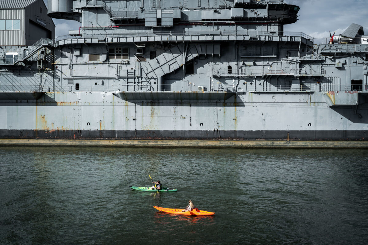 Kayakers by USS Intrepid, New York City