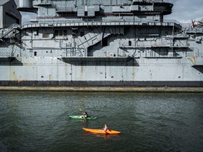 Kayakers by USS Intrepid, New York City