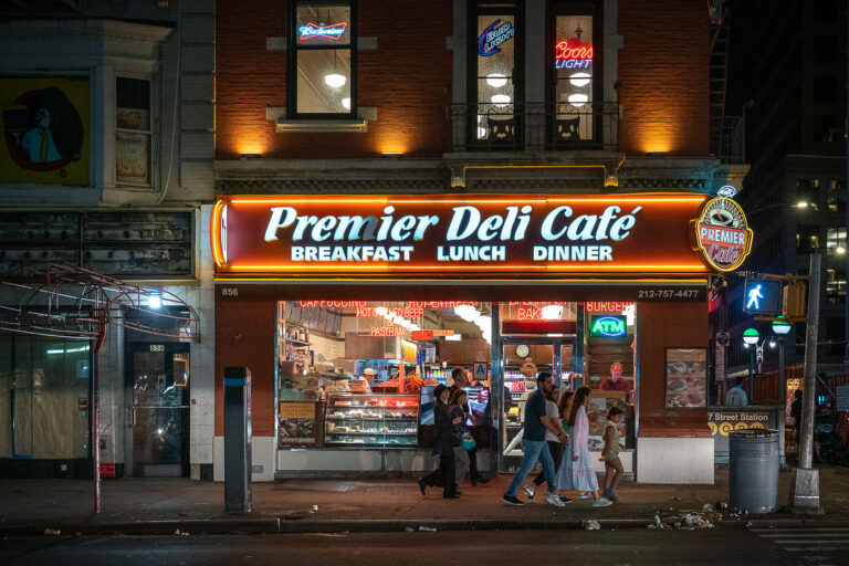 Premier Deli Cafe, Manhattan, New York City 8 Premier Deli Cafe at 856 Lexington Avenue, Manhattan, New York City, offers breakfast, lunch, and dinner, with prominent neon signage and an ATM.