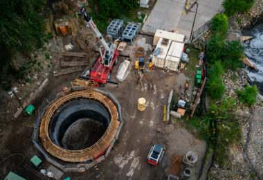 The shaft being made that will bring a tunnel boring machine to bore a tunnel under the Mississippi River for a water main.