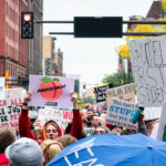 MNPEACHMENT March on Nicollet Mall, Downtown Minneapolis 4 Protesters crowd Nicollet Mall in downtown Minneapolis carrying handmade signs during a demonstration against then-President Donald Trump on October 10, 2019. The rally, tagged online as #MNPEACHMENT, drew thousands of Minnesotans expressing opposition to Trump’s policies and calling for impeachment. The march began near the Target Center, where Trump was holding a campaign rally, and stretched across downtown under a heavy police presence.
