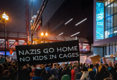 Crowds gathered outside the Target Center in downtown Minneapolis on October 10, 2019, during a Donald Trump campaign rally. Protesters held signs denouncing the administration’s immigration policies and far-right extremism, including one reading “Nazis Go Home – No Kids in Cages.” The event drew thousands of demonstrators and marked one of the city’s largest public displays of opposition during Trump’s presidency.