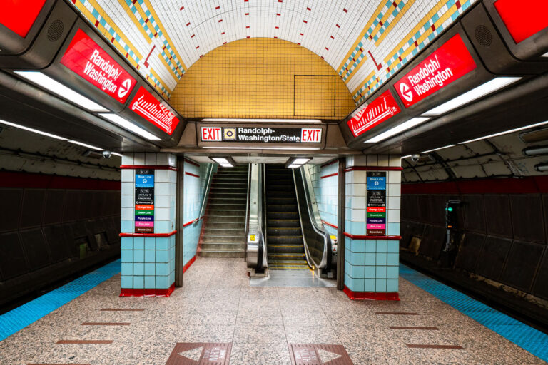 Randolph/Washington Station, Chicago Pedway Hub 4 Randolph/Washington station sits beneath the heart of downtown Chicago, forming part of the CTA Red Line that runs through the State Street subway. Opened in 1943 as part of the city’s ambitious subway expansion, the station connects directly to the extensive Chicago Pedway system, linking offices, retail centers, and civic buildings underground. Its tiled vault and distinctive 1940s-era design remain largely intact, representing the Art Moderne phase of Chicago’s transit infrastructure.
