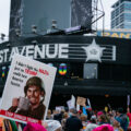 Sign reading "I didn't fight the nazi's just so Trump could turn America fascist" being held up outside First Avenue during a Trump protest in Minneapolis on October 10, 2019.