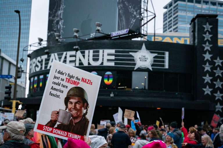 Stop Donald Trump! 4 Sign reading "I didn't fight the nazi's just so Trump could turn America fascist" being held up outside First Avenue during a Trump protest in Minneapolis on October 10, 2019.